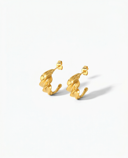 Gold sculptural twisted C-hoop earrings with fold-after-fold organic texture - FOUND Jewelry Canada
