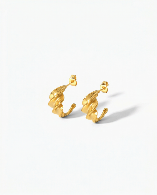 Gold sculptural twisted C-hoop earrings with fold-after-fold organic texture - FOUND Jewelry Canada
