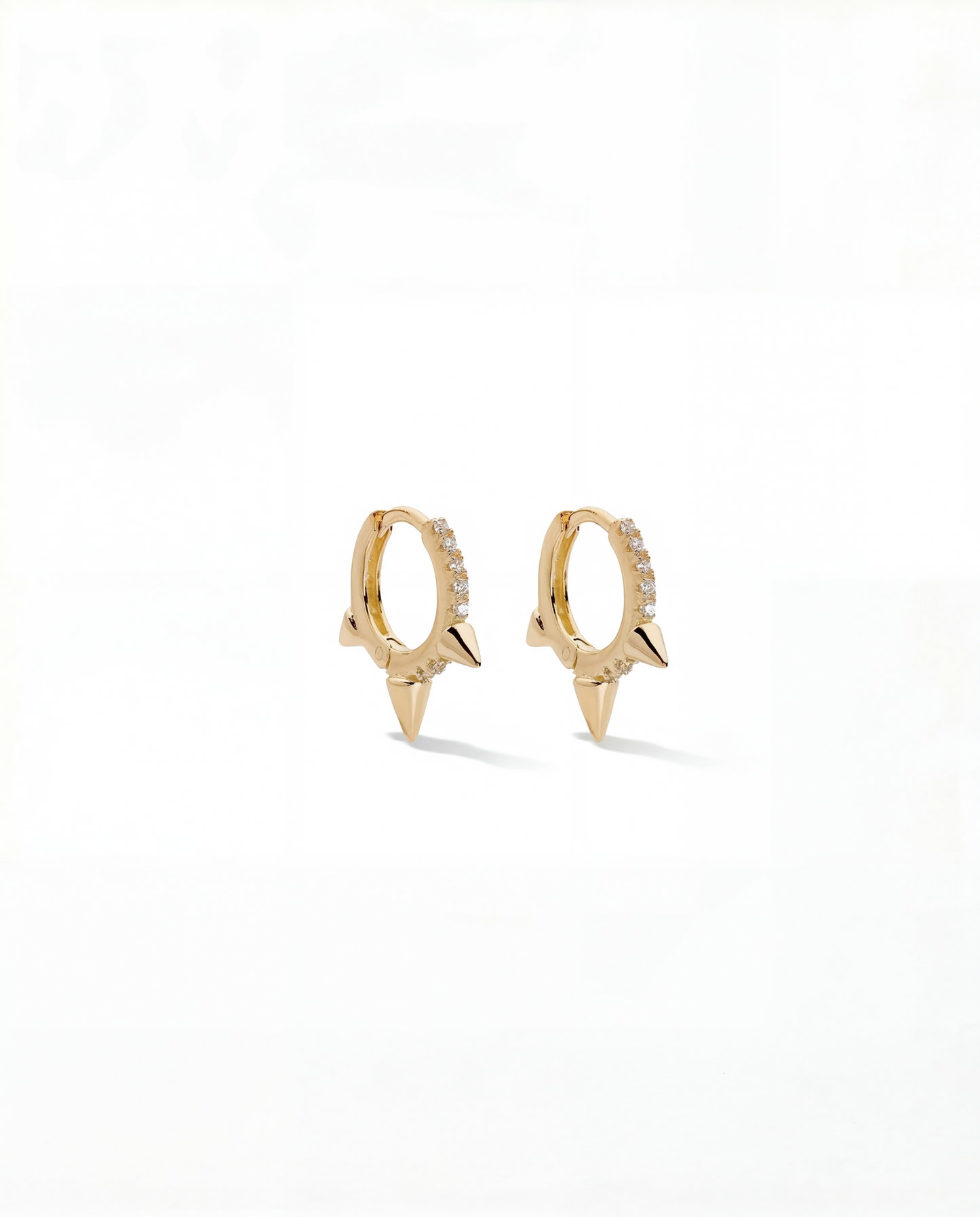 Gold pavŽ huggie hoop earrings with three downward pointing spikes - FOUND Jewelry Canada