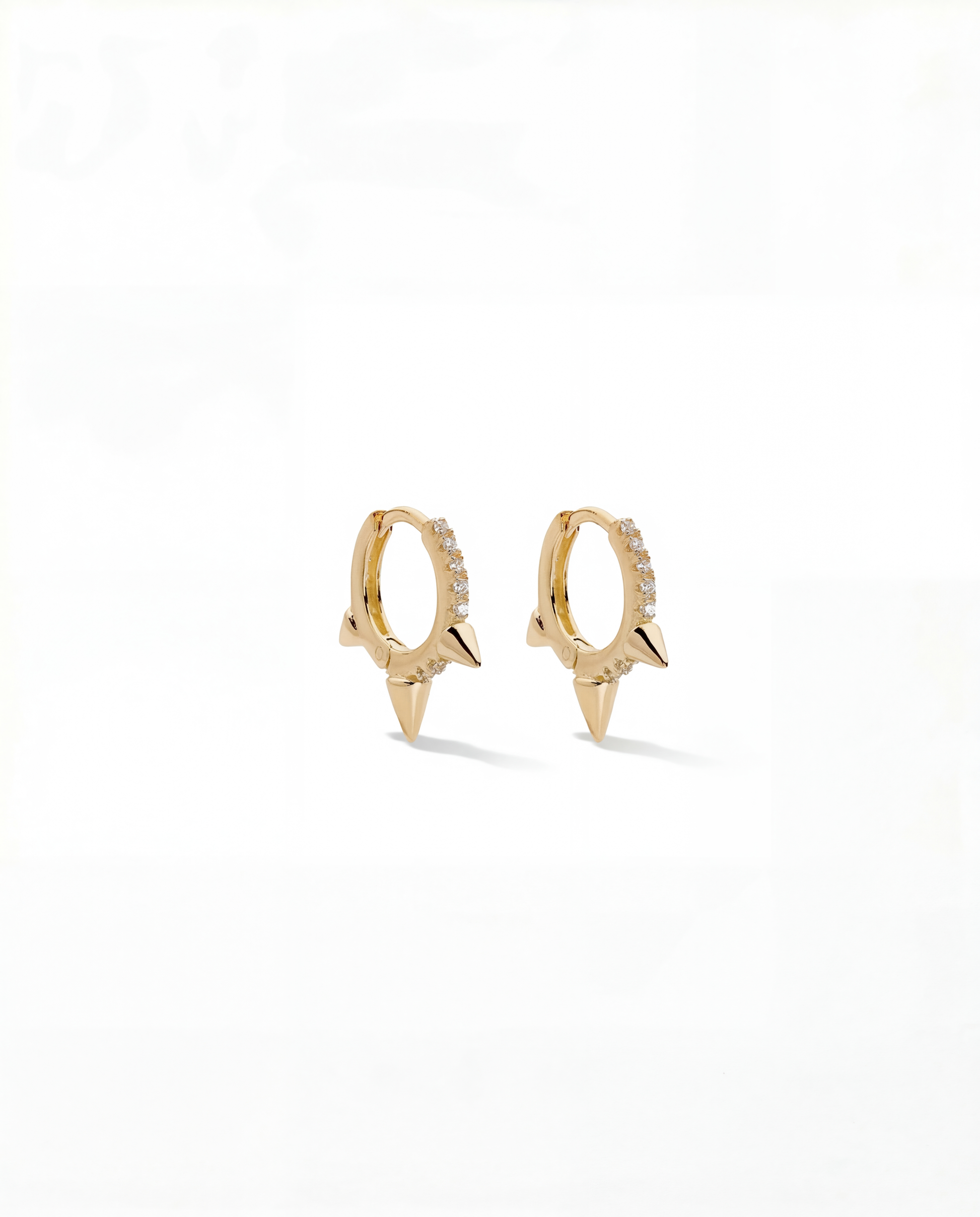 Gold pavŽ huggie hoop earrings with three downward pointing spikes - FOUND Jewelry Canada