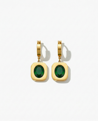 Gold huggie earring with wide gold frame pendant holding deep green oval stone Ð-FOUND Jewelry Canada