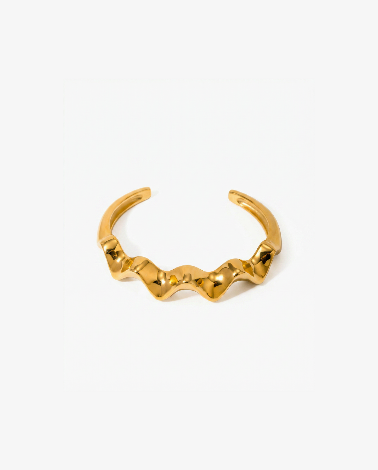 Bold gold open cuff bracelet with wide sculptural wave across the front - FOUND Jewelry Canada