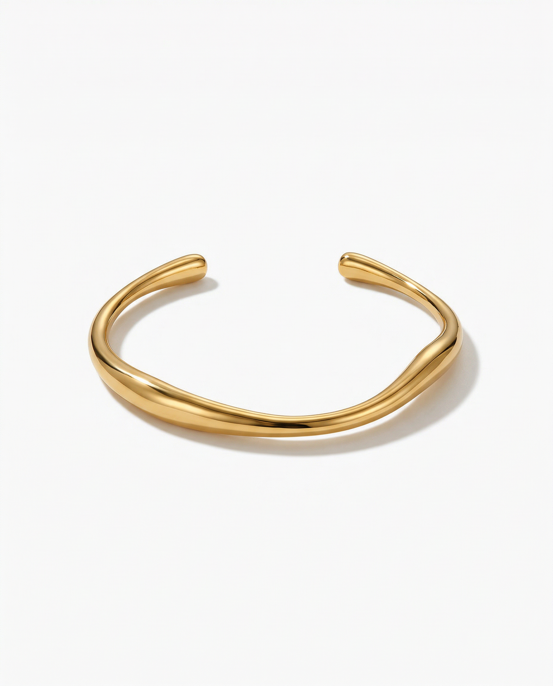 Slim polished gold open cuff bracelet with tapered rounded ends Ð FOUND Jewelry Canada