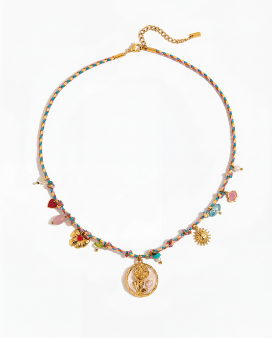 Pink teal woven cord necklace with gold rose medallion and scattered butterfly sun heart mixed charms - FOUND Jewelry Canada
