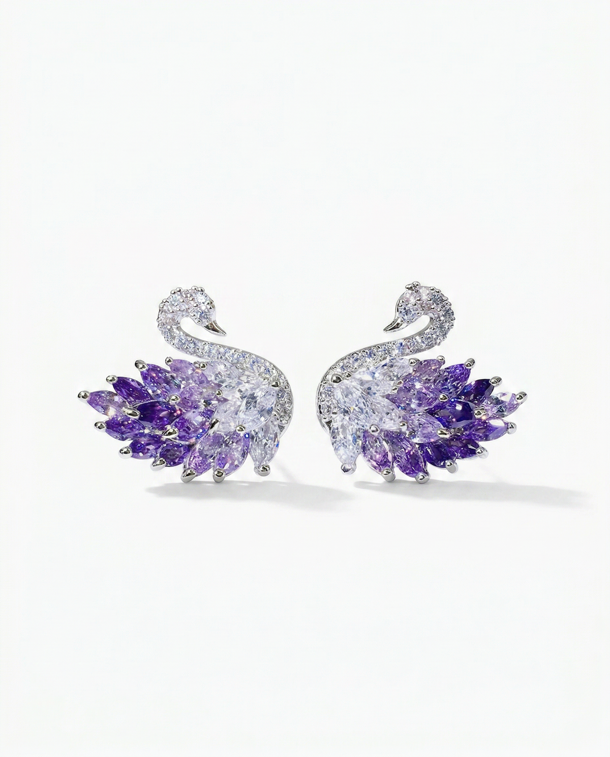 Silver swan wing statement earrings with gradient marquise CZ feathers in purple - FOUND Jewelry Canada